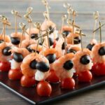 imgi_35_close-up-shot-fresh-shrimps-served-with-cherry-tomatoes-black-olives-wooden-table-luxury-restaurant-cafe-appetizer-seafood-vegetables-healthy-nutrition-eating_7502-5810